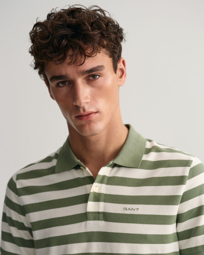 Polo en coton piqu&eacute; &agrave; rayures multicolores