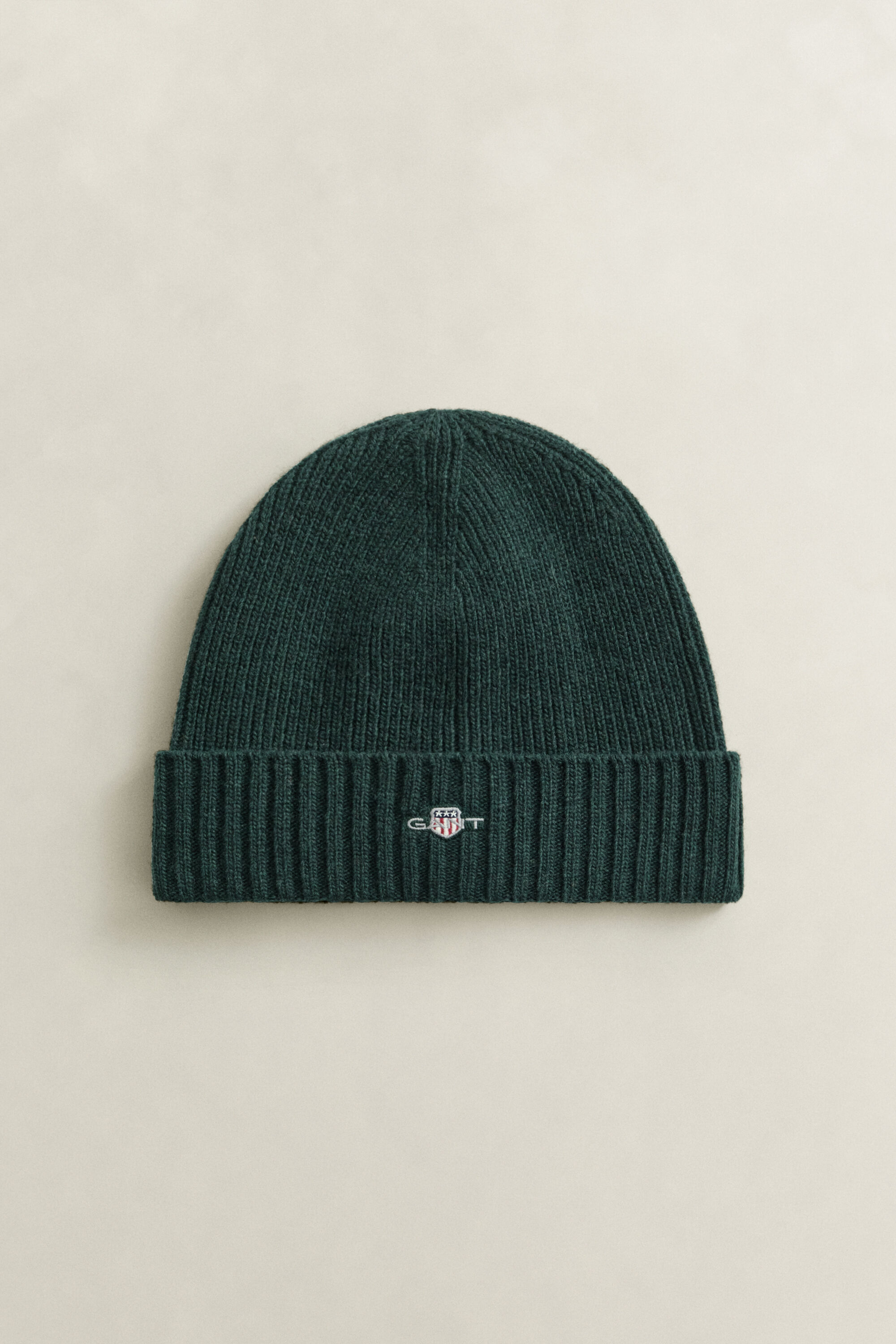 Bonnet en laine avec écusson