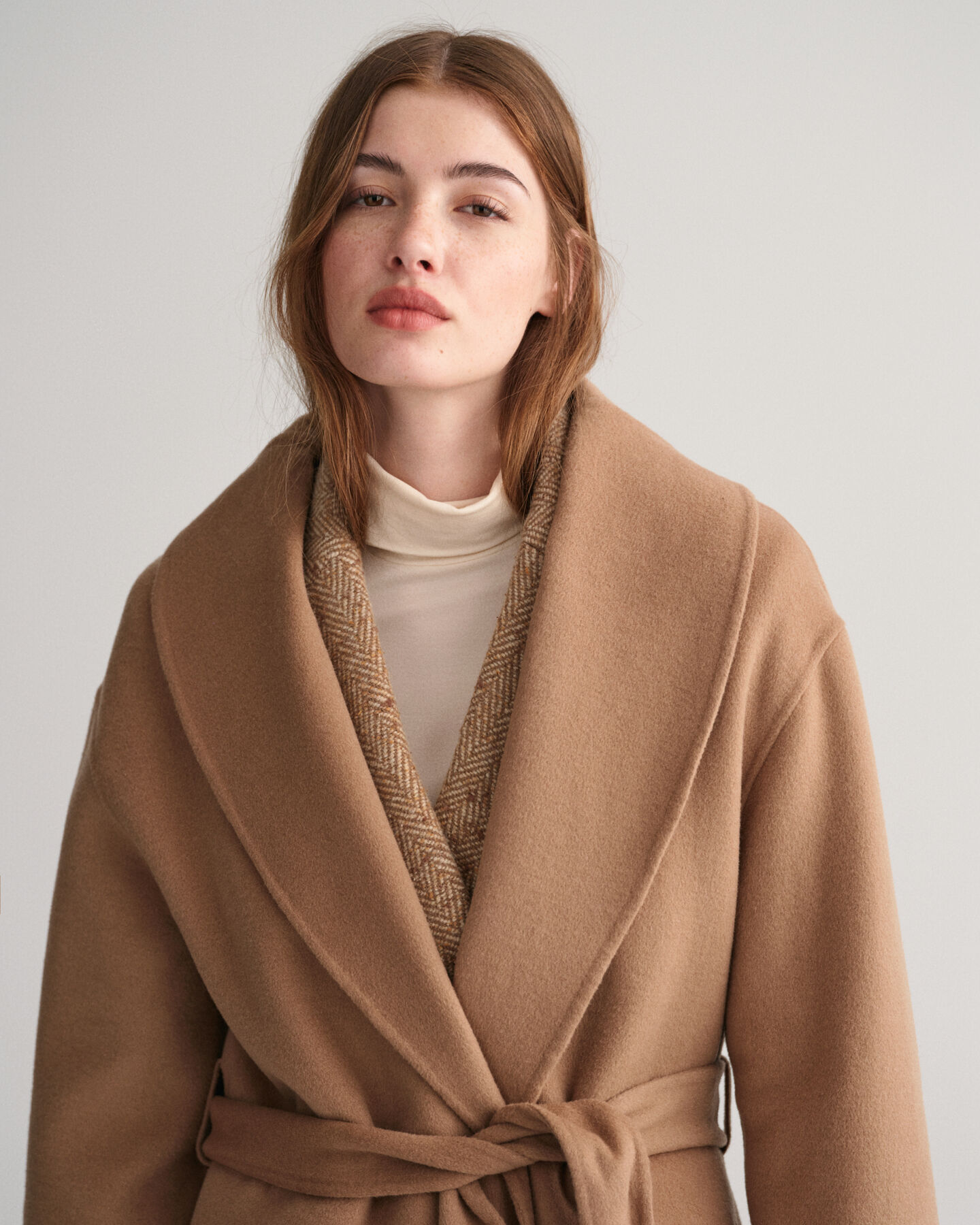 Manteau cousu main avec ceinture