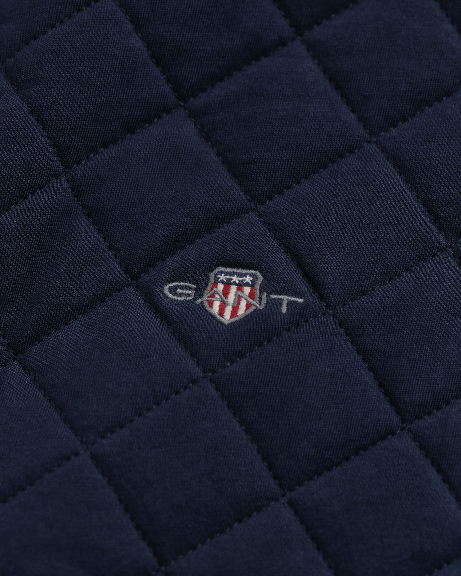 Sweat-shirt zippé matelassé avec col en velours côtelé