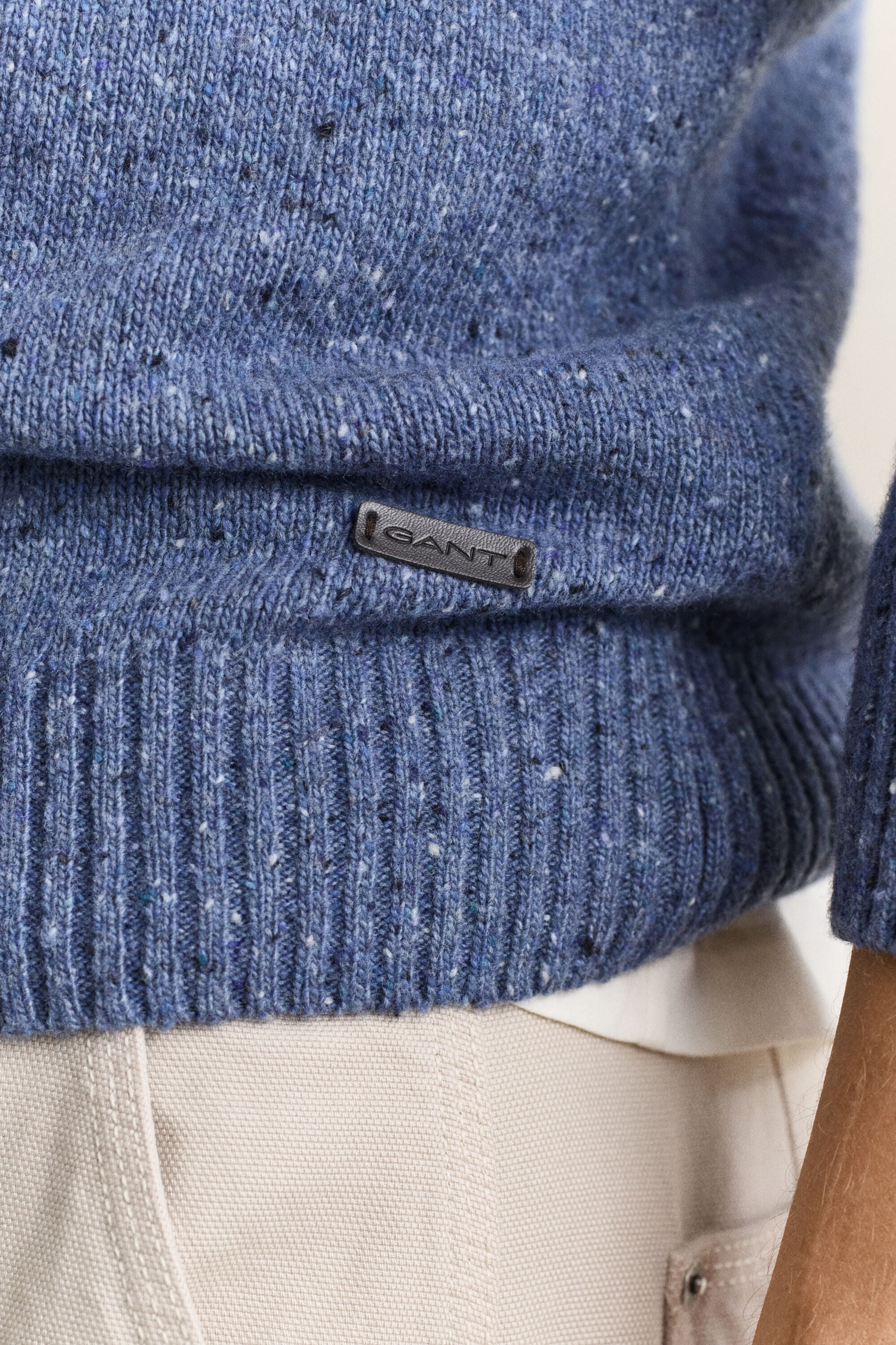 Pull façon polo en laine mouchetée mélangée