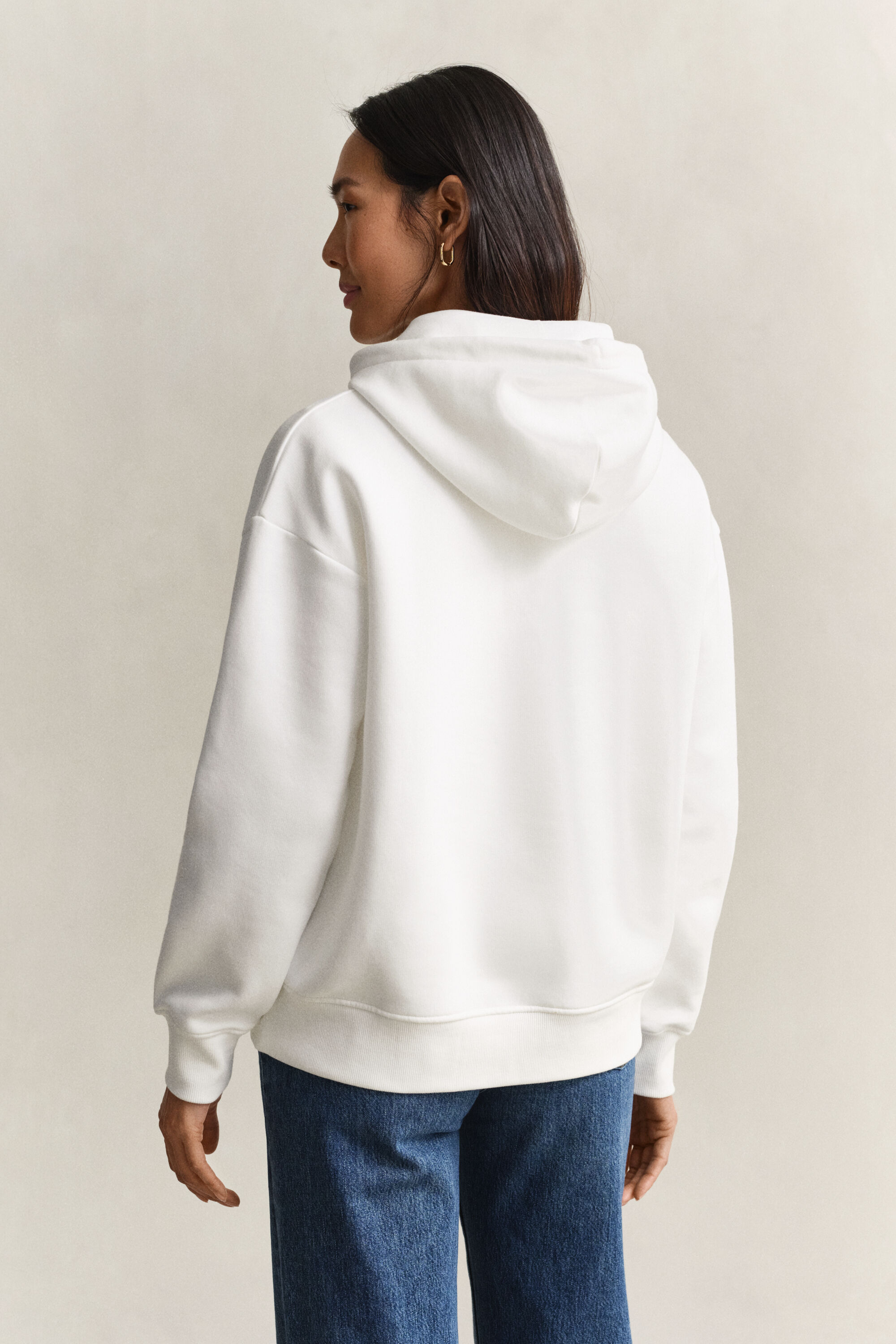 Sweat à capuche avec écusson