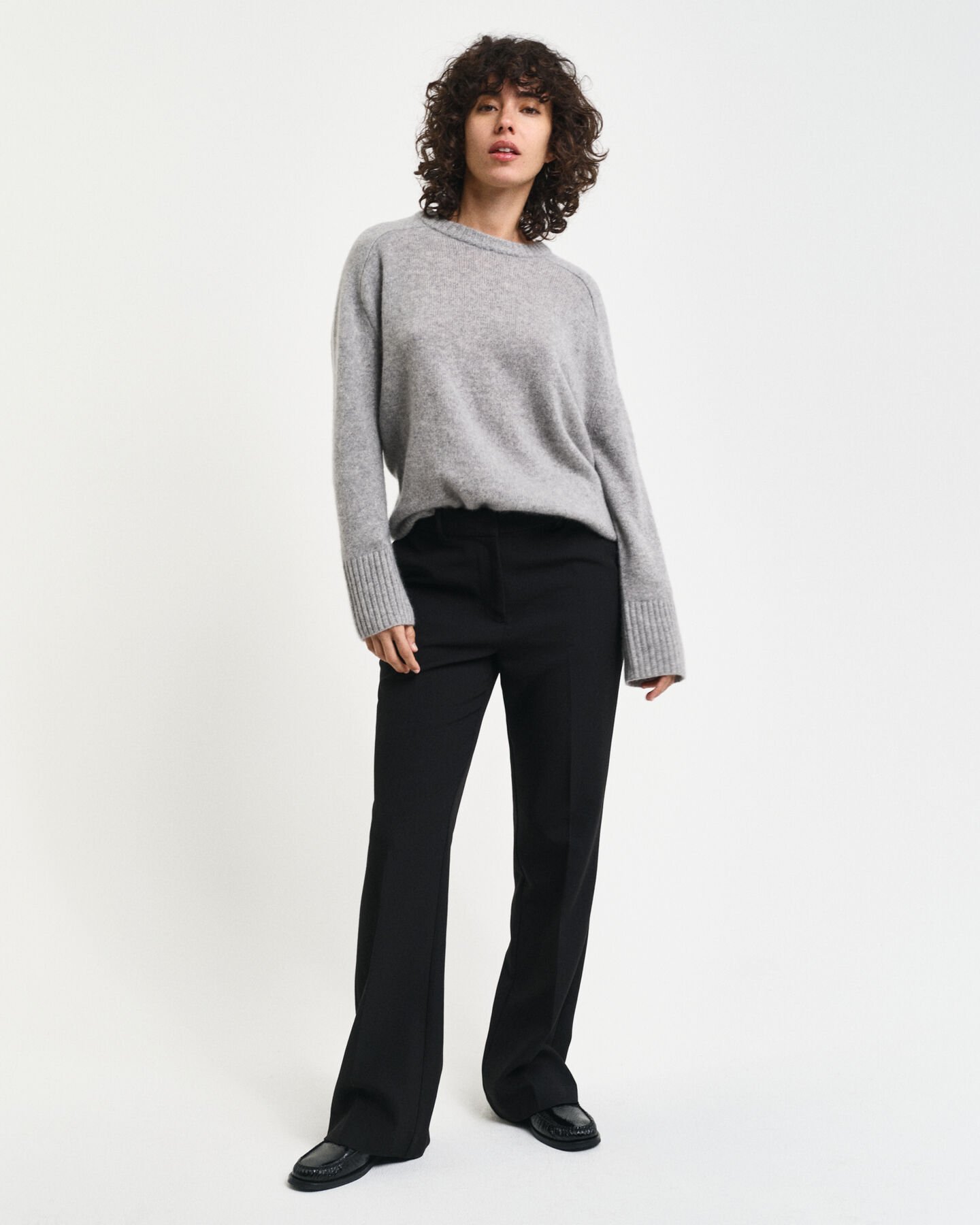 Pantalon habillé coupe slim évasé