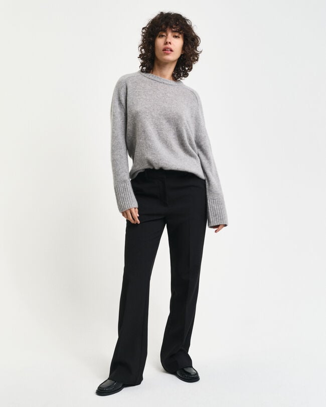 Pantalon habillé coupe slim évasé