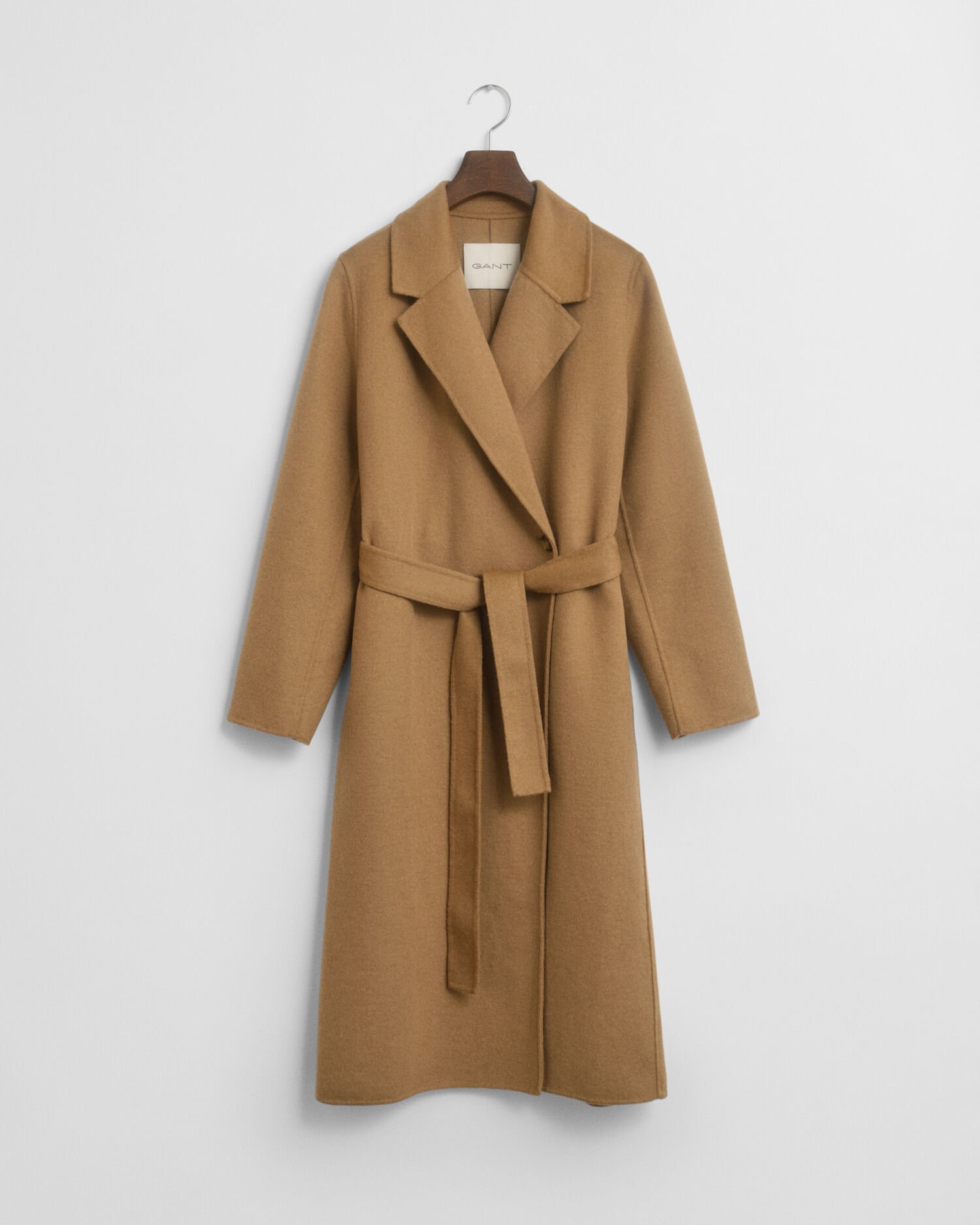 Manteau cousu main avec ceinture