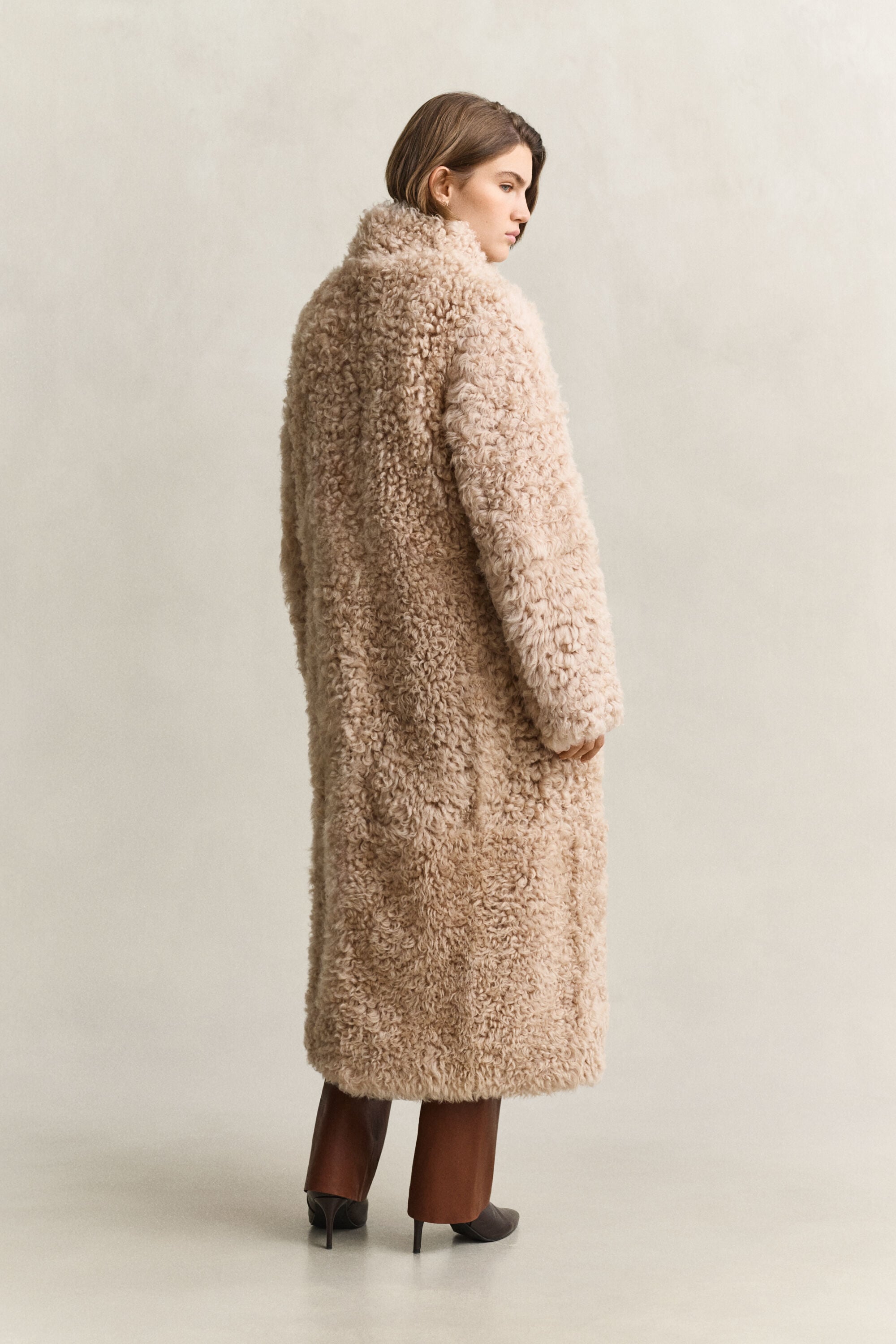 Manteau en peau lainée