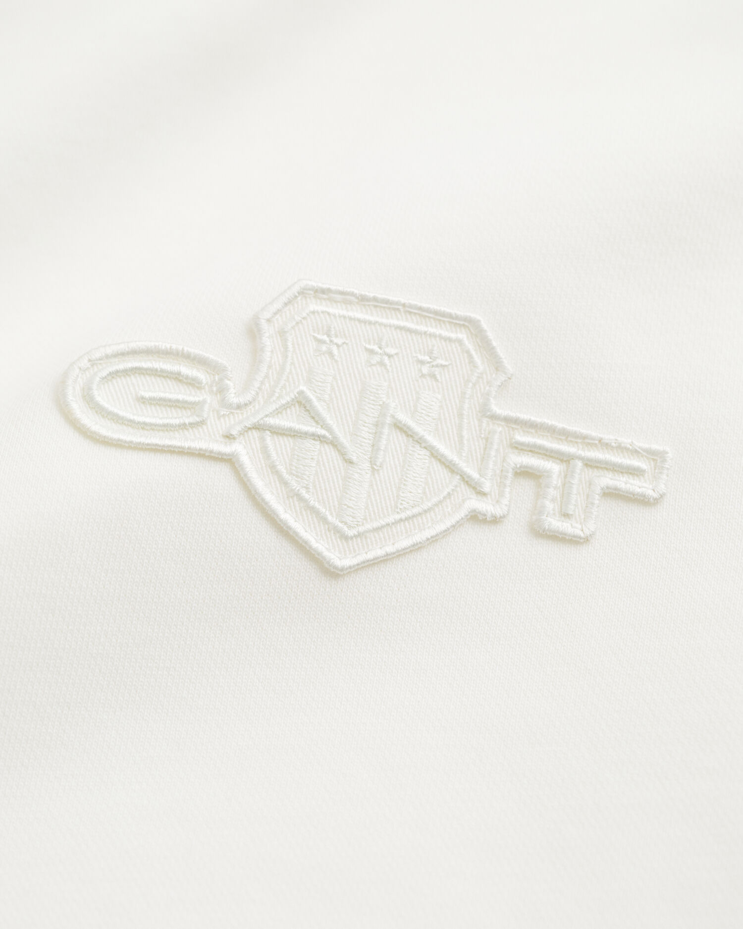 Sweat-shirt rond avec écusson ton sur ton