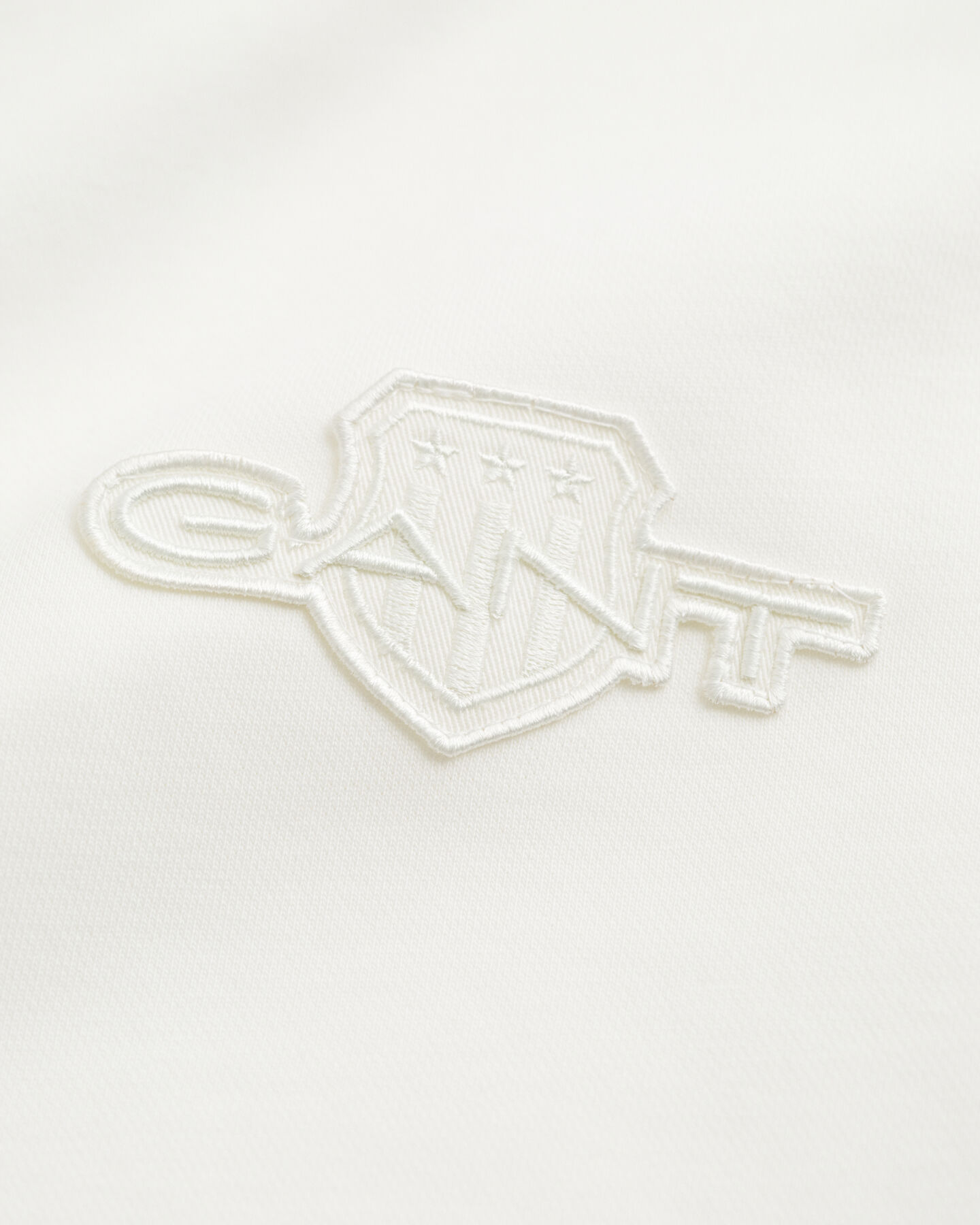 Sweat-shirt rond avec écusson ton sur ton