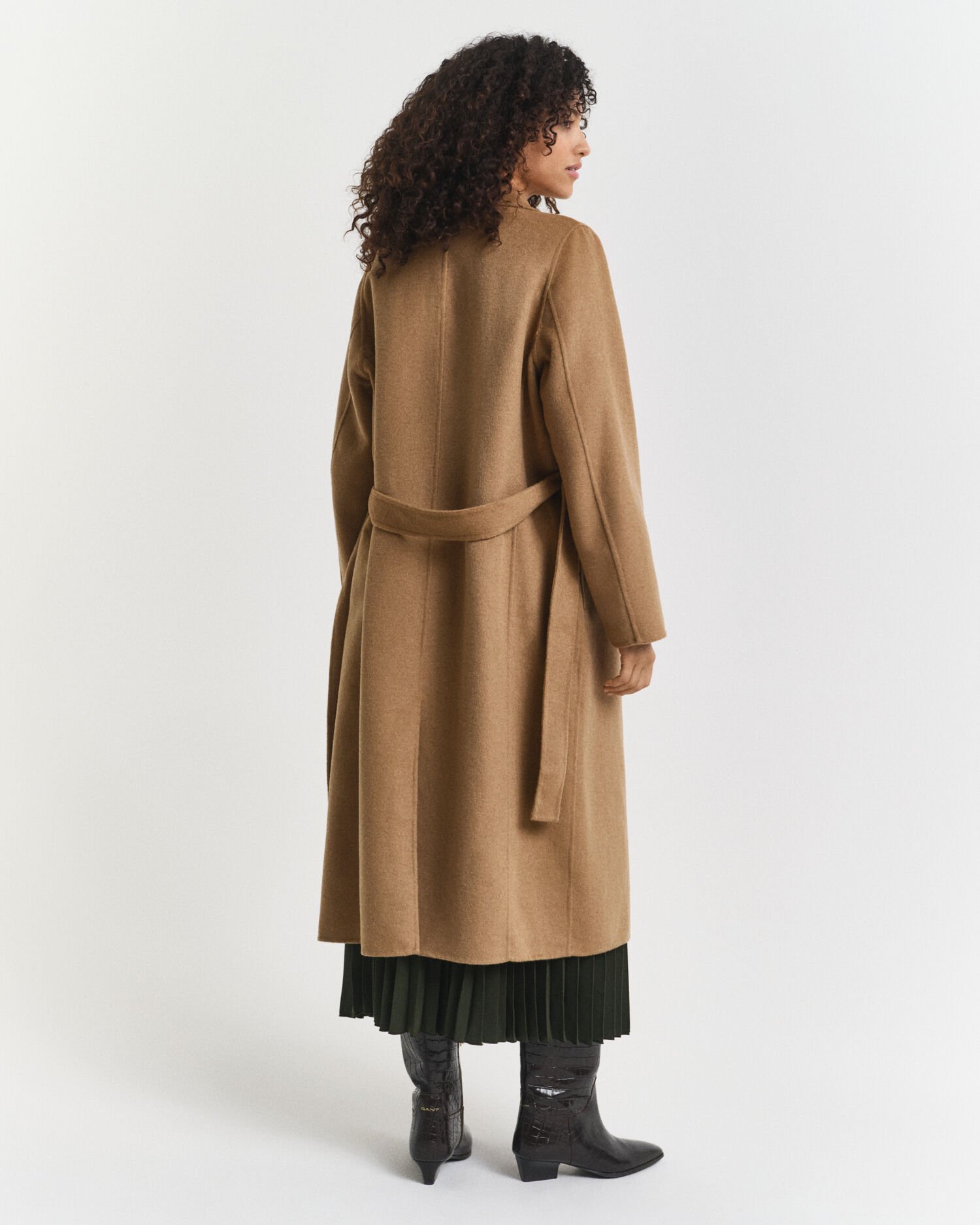 Manteau cousu main avec ceinture