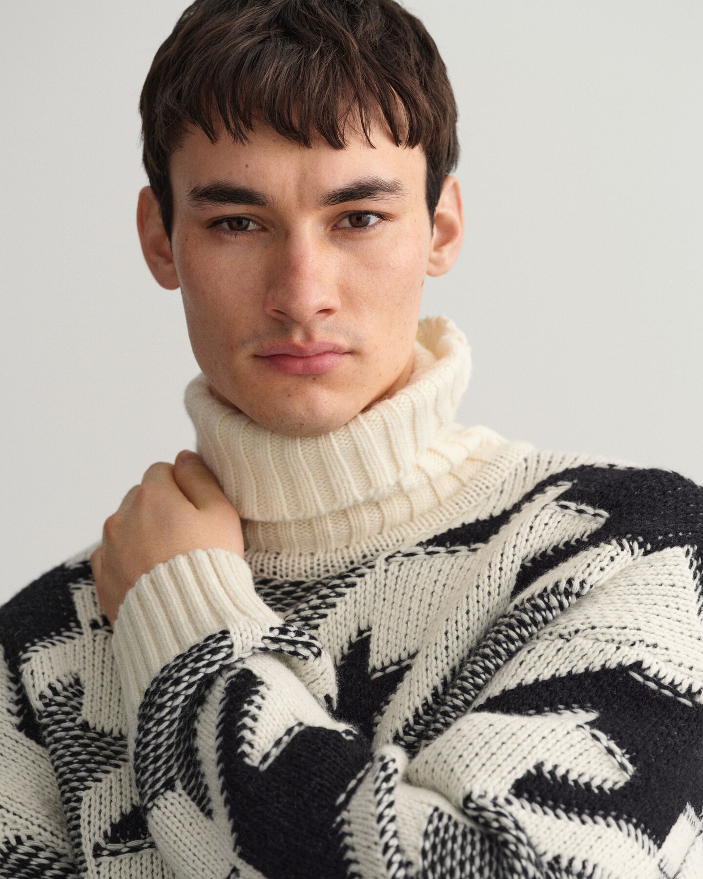 Pull col roulé à motif pied-de-poule