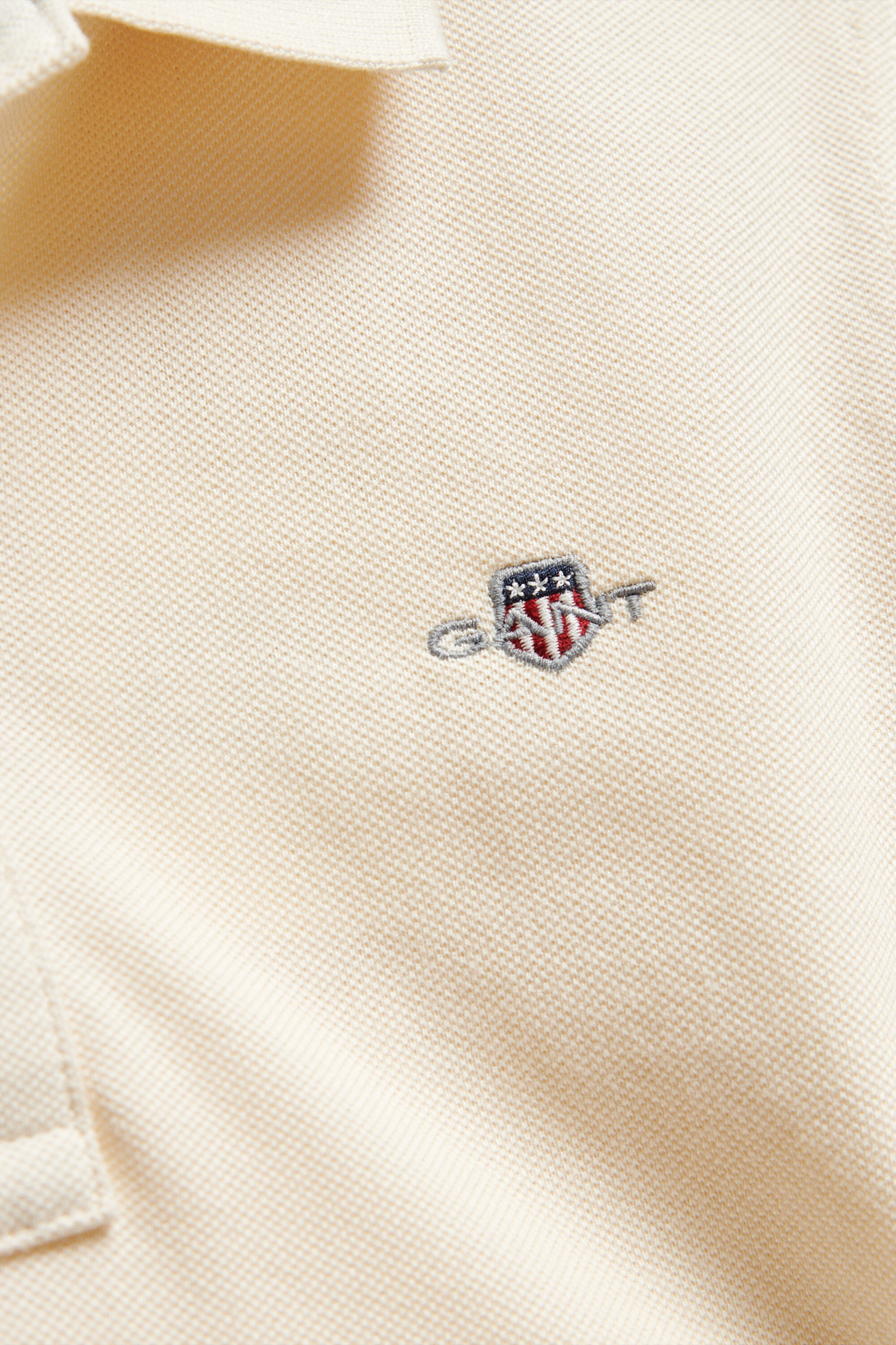 Polo en coton piqué Shield Ado