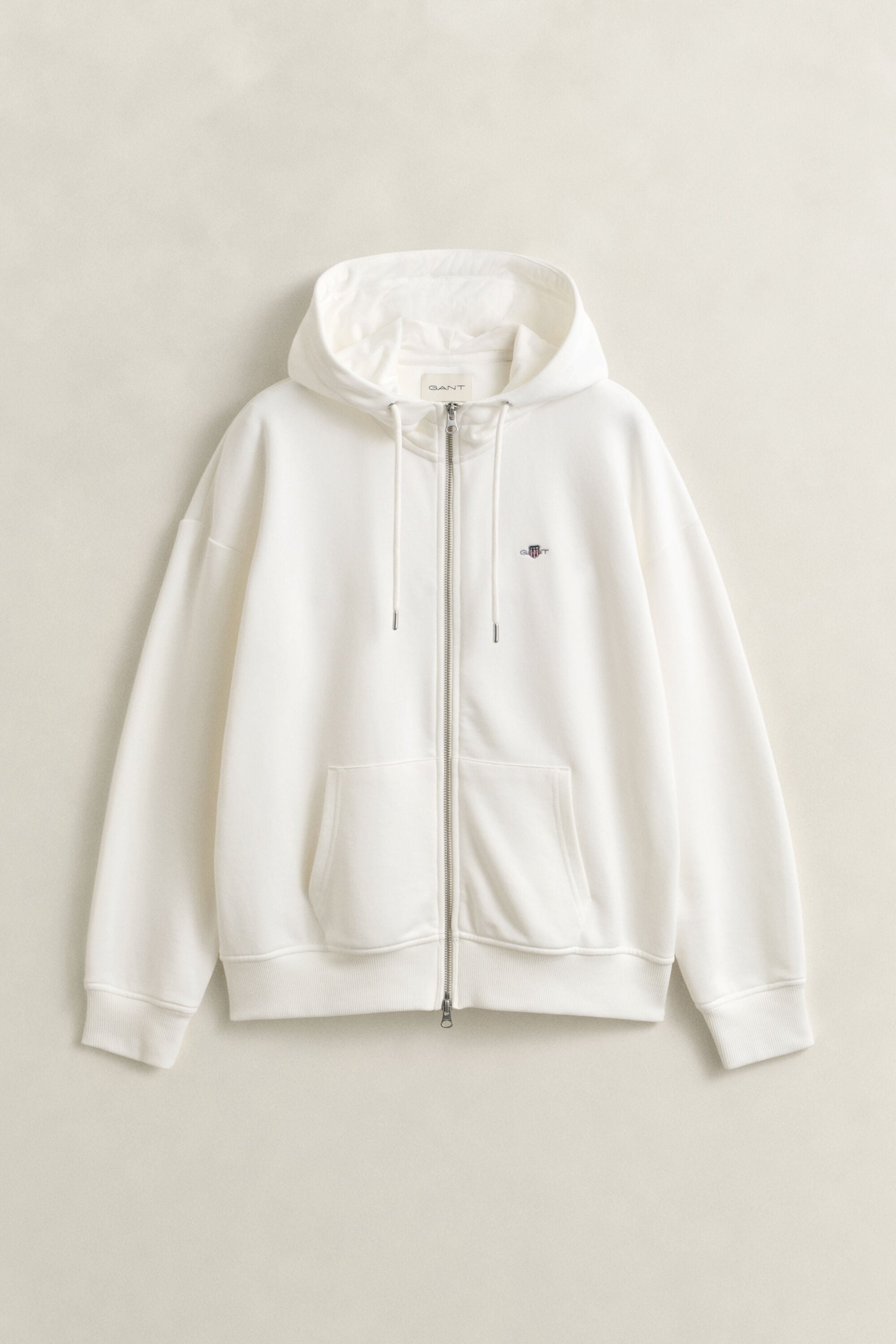 Sweat à capuche zippé avec écusson